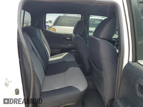2022 Toyota Tacoma SR с VIN 3TMCZ5AN7NM454051, выставлен на аукционе Copart как лот 59896115 с пробегом 70 202 миль миль и Списание • Salvage title. История ставок и продаж доступна на DreamBid. Изображение 10.