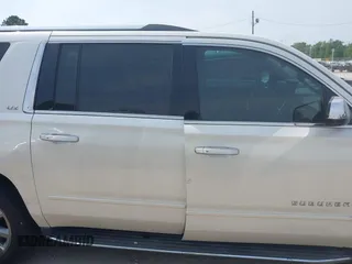 2015 Chevrolet Suburban LTZ with VIN 1GNSCKKC5FR740352, listed as a IAAI auction lot 39075234 with 112,945 mi miles and . Bid and sale history available at DreamBid. Image 14.