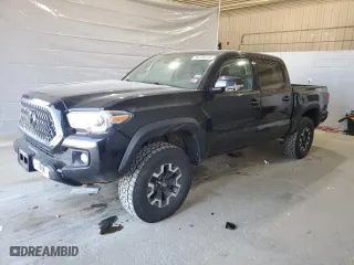 2019 Toyota Tacoma 4WD SR with VIN 5TFCZ5AN5KX185683, listed as a Copart auction lot 54176255 with 106,524 mi miles and Clean Title. Bid and sale history available at carsss.com. Image 1.