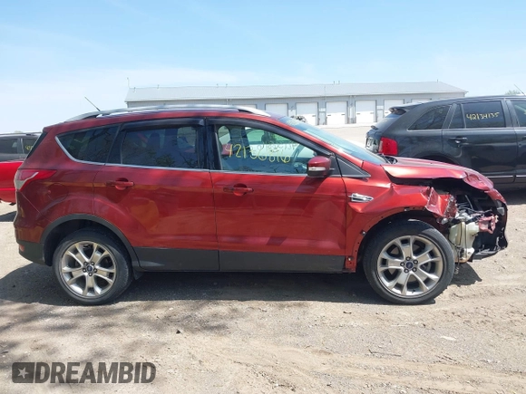 2015 Ford Escape Titanium with VIN 1FMCU0J92FUA38616, listed as a IAAI auction lot 42136816 with 131,941 mi miles and . Bid and sale history available at DreamBid. Image 13.