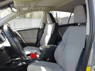 2016 Toyota RAV4 Hybrid XLE with VIN JTMRJREVXGD029019, listed as a IAAI auction lot 42021530 with 74,400 mi miles. Bid and sale history available at carsss.com. Image 19.