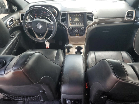 2015 Jeep Grand Cherokee Overland with VIN 1C4RJFCG6FC919637, listed as a Copart auction lot 52072925 with 111,552 mi miles and Salvage Title. Bid and sale history available at carsss.com. Image 8.