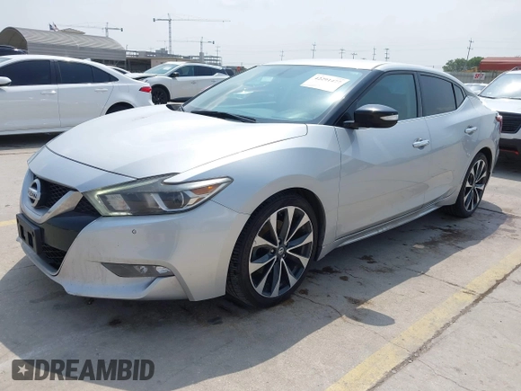 2017 Nissan Maxima SR z VIN 1N4AA6AP9HC397126, wystawiony jako IAAI lot #42291477 z przebiegiem 115 201 mil mil oraz . Historia ofert i sprzedaży dostępna na DreamBid. Obrazek 17.
