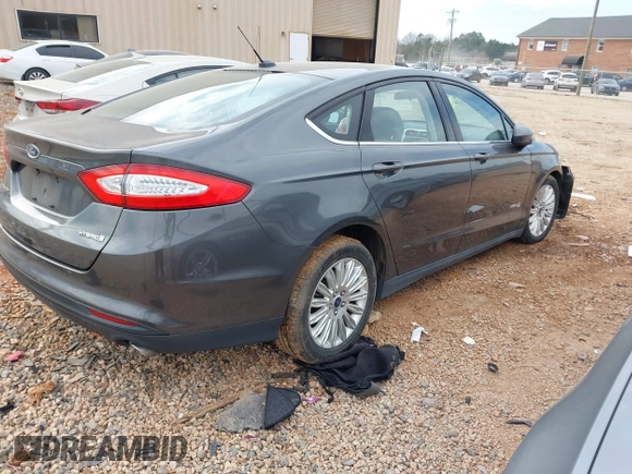 2015 Ford Fusion S Hybrid with VIN 3FA6P0UU7FR167229, listed as a IAAI auction lot 41684934 with 135,317 mi miles. Bid and sale history available at carsss.com. Image 4.