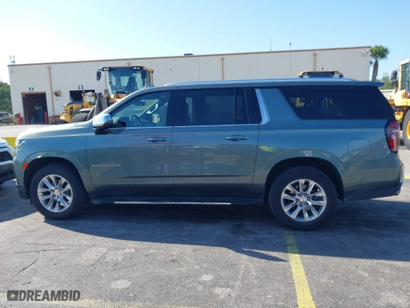 2023 Chevrolet Suburban Premier with VIN 1GNSCFKD4PR378869, listed as a IAAI auction lot 41802386 with 58,569 mi miles. Bid and sale history available at carsss.com. Image 14.