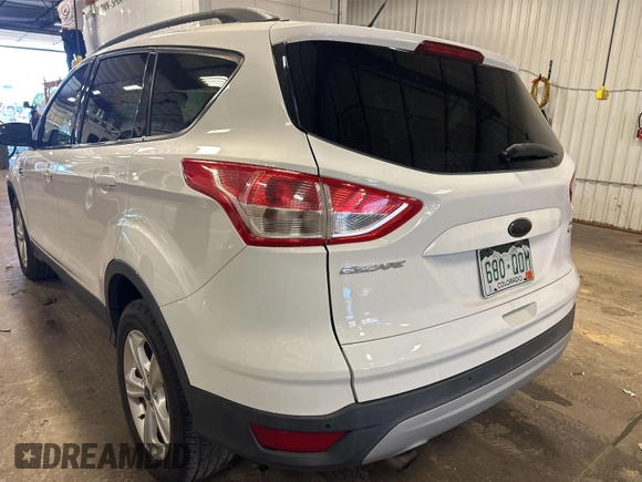 2014 Ford Escape SE with VIN 1FMCU9G94EUD80272, listed as a IAAI auction lot 42737727 with 138,226 mi miles and . Bid and sale history available at DreamBid. Image 18.
