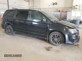 2014 Dodge Grand Caravan SXT 30th Anniversary with VIN 2C4RDGCG1ER200489, listed as a Copart auction lot 52558915 with 127,035 mi miles and Salvage Title. Bid and sale history available at DreamBid. Image 4.