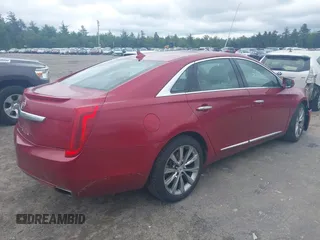 2013 Cadillac XTS Luxury z VIN 2G61R5S38D9229278, wystawiony jako IAAI lot #42321672 z przebiegiem 89 537 mil mil oraz . Historia ofert i sprzedaży dostępna na DreamBid. Obrazek 4.