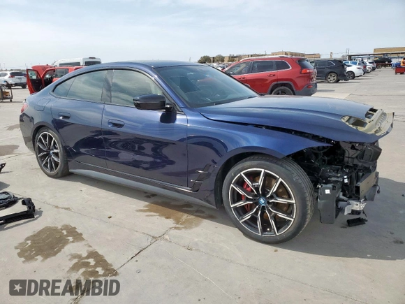 2023 BMW i4 eDrive40 z VIN WBY73AW08PFR19950, wystawiony jako Copart lot #48003365 z przebiegiem Nie podano mil oraz Szkody całkowita. Historia ofert i sprzedaży dostępna na DreamBid. Obrazek 4.