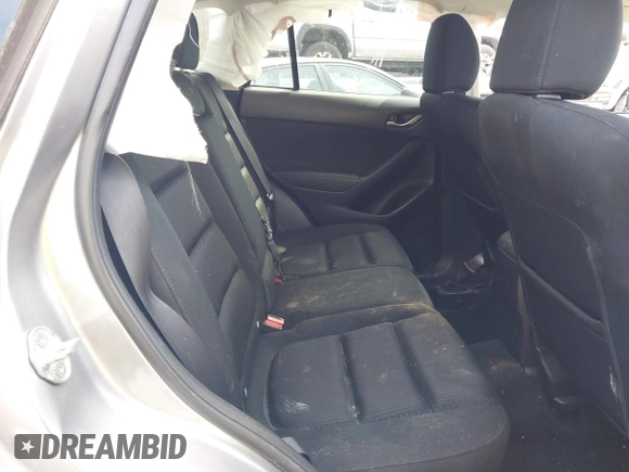 2015 Mazda CX-5 Touring with VIN JM3KE2CY6F0432910, listed as a IAAI auction lot 41784545 with 210,787 mi miles. Bid and sale history available at carsss.com. Image 8.