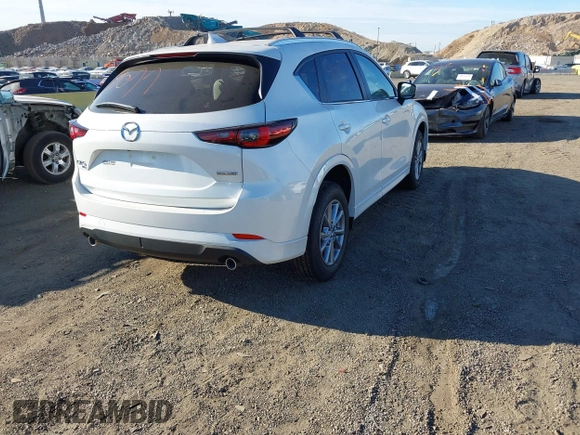 2024 Mazda CX-5 2.5 S Preferred Package with VIN JM3KFBCL5R0516853, listed as a IAAI auction lot 40859077 with 397 mi miles. Bid and sale history available at carsss.com. Image 4.