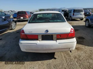 2000 Mercury Grand Marquis LS z VIN 2MEFM75W7YX626483, wystawiony jako Copart lot #54868355 z przebiegiem 233 985 mil mil oraz Tytuł czysty. Historia ofert i sprzedaży dostępna na DreamBid. Obrazek 6.