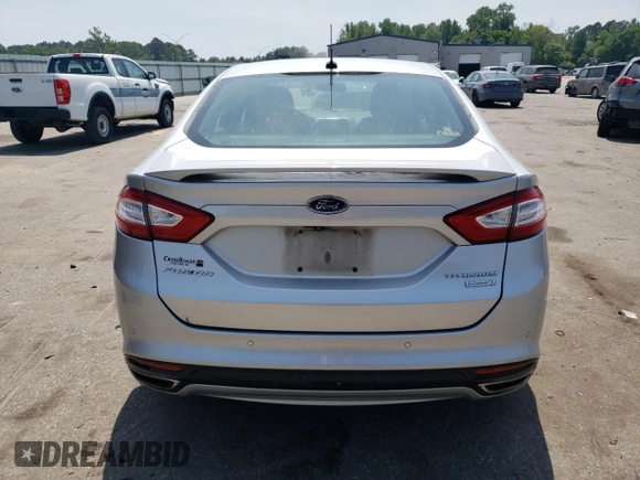 2014 Ford Fusion Titanium с VIN 3FA6P0K90ER363283, выставлен на аукционе Copart как лот 55156795 с пробегом 54 099 миль миль и Списание • Salvage title. История ставок и продаж доступна на DreamBid. Изображение 6.