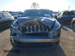 2016 Jeep Cherokee Sport with VIN 1C4PJLAB7GW258181, listed as a IAAI auction lot 42017043 with 154,545 mi miles and . Bid and sale history available at DreamBid. Image 12.