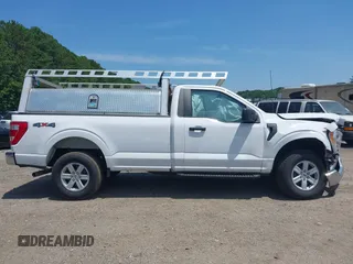 2021 Ford F-150 XL with VIN 1FTMF1E5XMKE21132, listed as a IAAI auction lot 42445898 with 114,014 mi miles and . Bid and sale history available at DreamBid. Image 14.