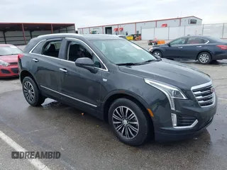2019 Cadillac XT5 Luxury AWD z VIN 1GYKNDRSXKZ266172, wystawiony jako IAAI lot #41984221 z przebiegiem 70 557 mil mil oraz . Historia ofert i sprzedaży dostępna na DreamBid. Obrazek 1.