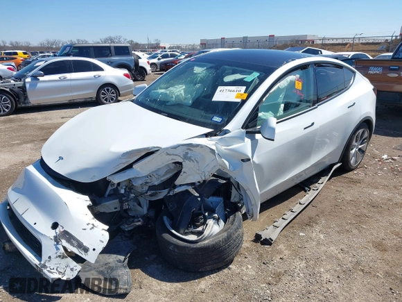 2021 Tesla Model Y Long Range with VIN 5YJYGDEE0MF106255, listed as a IAAI auction lot 41736610 with Not Provided miles. Bid and sale history available at carsss.com. Image 6.