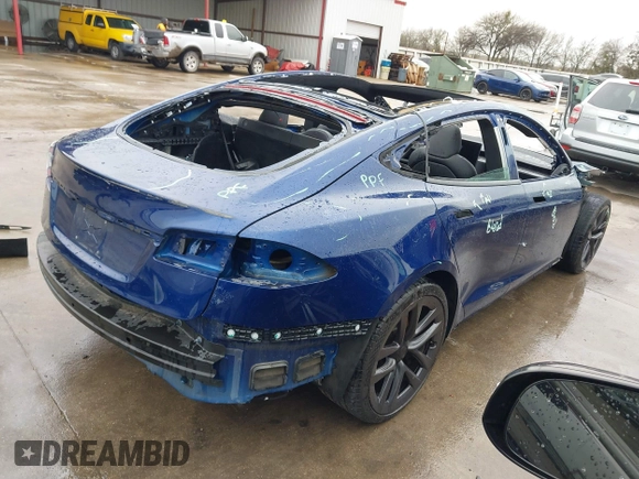 2021 Tesla Model S Plaid with VIN 5YJSA1E60MF440042, listed as a IAAI auction lot 41563347 with 40,981 mi miles. Bid and sale history available at carsss.com. Image 4.