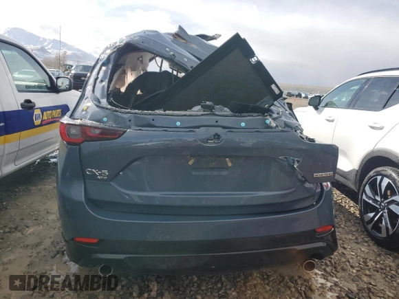 2024 Mazda CX-5 S Carbon Edition with VIN JM3KFBCLXR0465981, listed as a Copart auction lot 48335995 with Not Provided miles and Salvage Title. Bid and sale history available at DreamBid. Image 6.