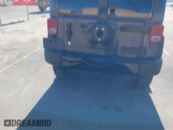 2018 Jeep Wrangler JK Unlimited Sport S with VIN 1C4BJWDG4JL868700, listed as a IAAI auction lot 41349566 with 68,539 mi miles. Bid and sale history available at carsss.com. Image 16.