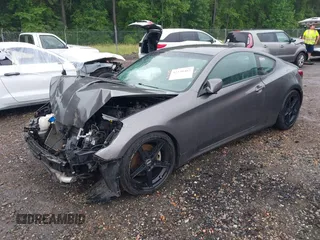 2013 Hyundai Genesis Coupe Premium z VIN KMHHT6KD5DU095906, wystawiony jako IAAI lot #42230462 z przebiegiem 118 279 mil mil oraz . Historia ofert i sprzedaży dostępna na DreamBid. Obrazek 2.