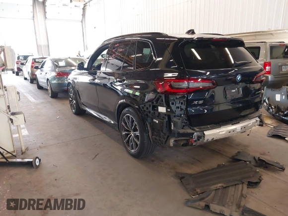 2022 BMW X5 xDrive45e with VIN 5UXTA6C05N9L41274, listed as a IAAI auction lot 42247190 with 18,701 mi miles and . Bid and sale history available at DreamBid. Image 3.