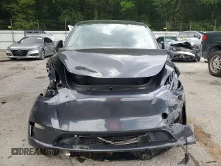 2024 Tesla Model Y Long Range с VIN 7SAYGDEE7RA271520, выставлен на аукционе Copart как лот 56526025 с пробегом 28 745 миль миль и Списание • Salvage title. История ставок и продаж доступна на DreamBid. Изображение 5.