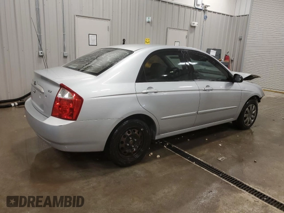 2005 Kia Spectra LX with VIN KNAFE121655148281, listed as a Copart auction lot 76677864 with 115,299 mi miles and Clean Title. Bid and sale history available at carsss.com. Image 3.