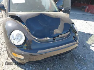 2005 Volkswagen New Beetle Coupe GL with VIN 3VWBK31C25M413925, listed as a IAAI auction lot 39823280 with 72,382 mi miles. Bid and sale history available at carsss.com. Image 6.