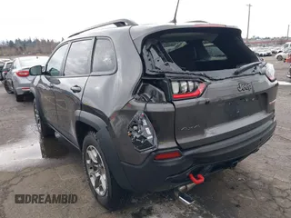 2022 Jeep Cherokee Trailhawk with VIN 1C4PJMBX6ND505196, listed as a IAAI auction lot 41536316 with 9,976 mi miles. Bid and sale history available at carsss.com. Image 3.