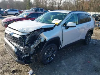 2024 Toyota RAV4 Hybrid XLE Premium with VIN JTMB6RFV3RJ045018, listed as a IAAI auction lot 41610974 with 13,765 mi miles. Bid and sale history available at carsss.com. Image 6.