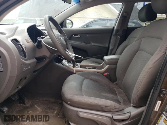 2015 Kia Sportage LX z VIN KNDPB3AC5F7728416, wystawiony jako Copart lot #54990375 z przebiegiem 194 934 mil mil oraz Czysty tytuł • Clean title. Historia ofert i sprzedaży dostępna na DreamBid. Obrazek 7.