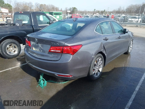 2020 Acura TLX Technology with VIN 19UUB1F50LA015540, listed as a IAAI auction lot 41710482 with 52,932 mi miles and . Bid and sale history available at carsss.com. Image 4.