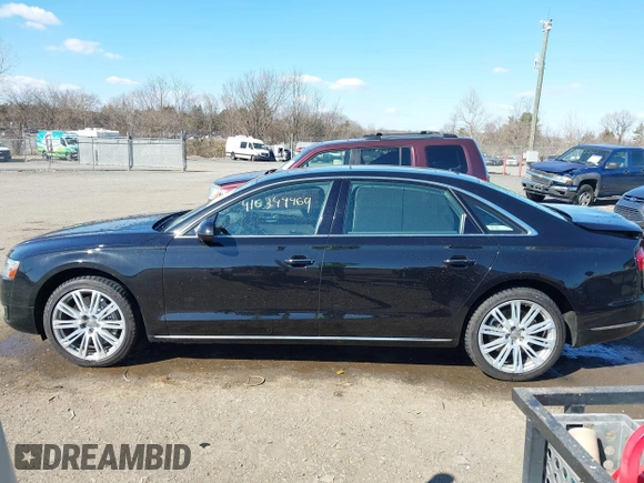 2015 Audi A8 L 4.0T with VIN WAU32AFD1FN021343, listed as a IAAI auction lot 41634469 with 88,229 mi miles. Bid and sale history available at carsss.com. Image 15.