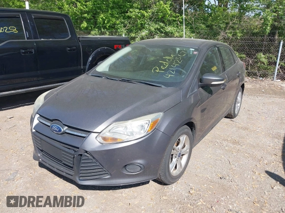 2013 Ford Focus SE with VIN 1FADP3F25DL351343, listed as a IAAI auction lot 42142367 with 146,850 mi miles. Bid and sale history available at carsss.com. Image 2.