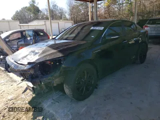 2015 Kia Optima EX with VIN 5XXGN4A72FG444555, listed as a Copart auction lot 88497455 with 176,229 mi miles and Salvage Title. Bid and sale history available at carsss.com. Image 1.