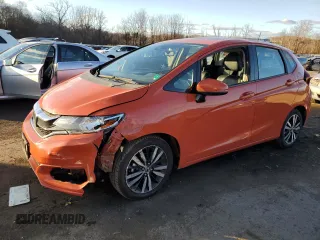 2018 Honda Fit EX-L with VIN 3HGGK5H95JM700881, listed as a Copart auction lot 79880414 with 77,238 mi miles and Salvage Title. Bid and sale history available at carsss.com. Image 1.