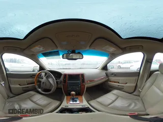 2005 Cadillac STS z VIN 1G6DC67A250231552, wystawiony jako IAAI lot #41765312 z przebiegiem 201 611 mil mil oraz . Historia ofert i sprzedaży dostępna na DreamBid. Obrazek 18.