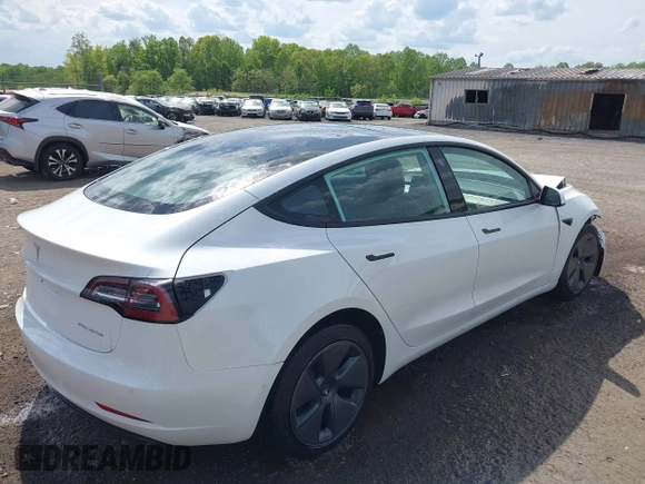 2022 Tesla Model 3 Long Range z VIN 5YJ3E1EB4NF183832, wystawiony jako IAAI lot #42085815 z przebiegiem 35 880 mil mil oraz . Historia ofert i sprzedaży dostępna na DreamBid. Obrazek 4.