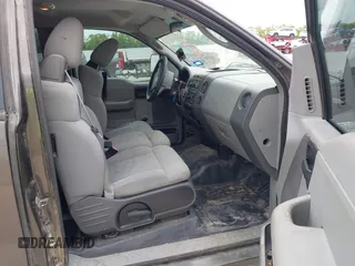 2006 Ford F-150 STX with VIN 1FTRX12W46KC84403, listed as a IAAI auction lot 41990451 with 243,606 mi miles. Bid and sale history available at carsss.com. Image 5.