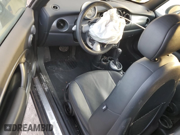 2007 MINI Convertible with VIN WMWRF33557TG17675, listed as a Copart auction lot 49206875 with Not Provided miles and Clean Title. Bid and sale history available at DreamBid. Image 8.