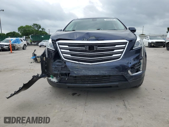 2017 Cadillac XT5 Luxury AWD z VIN 1GYKNDRS1HZ121319, wystawiony jako Copart lot #54938505 z przebiegiem 71 519 mil mil oraz Szkoda całkowita • Salvage title. Historia ofert i sprzedaży dostępna na DreamBid. Obrazek 5.