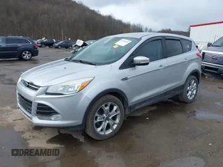 2013 Ford Escape SEL with VIN 1FMCU9H93DUA81448, listed as a IAAI auction lot 41790631 with 176,015 mi miles. Bid and sale history available at carsss.com. Image 2.