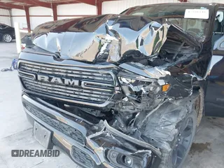 2021 Ram 1500 Big Horn with VIN 1C6SRFBT2MN562927, listed as a IAAI auction lot 42386848 with 83,858 mi miles and . Bid and sale history available at DreamBid. Image 6.