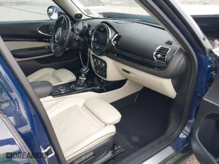 2016 MINI Cooper Clubman with VIN WMWLN5C54G2E30843, listed as a IAAI auction lot 41371368 with 1 mi miles. Bid and sale history available at carsss.com. Image 5.
