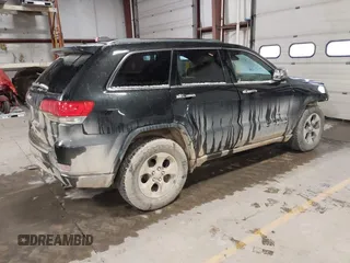 2014 Jeep Grand Cherokee Limited with VIN 1C4RJFBT1EC156536, listed as a IAAI auction lot 41053655 with 204,008 mi miles and . Bid and sale history available at DreamBid. Image 4.