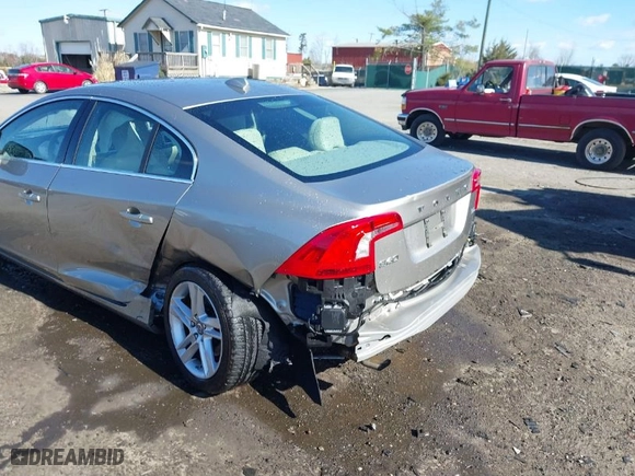 2014 Volvo S60 T5 with VIN YV1612FS8E1297431, listed as a IAAI auction lot 41876534 with 105,483 mi miles. Bid and sale history available at carsss.com. Image 6.
