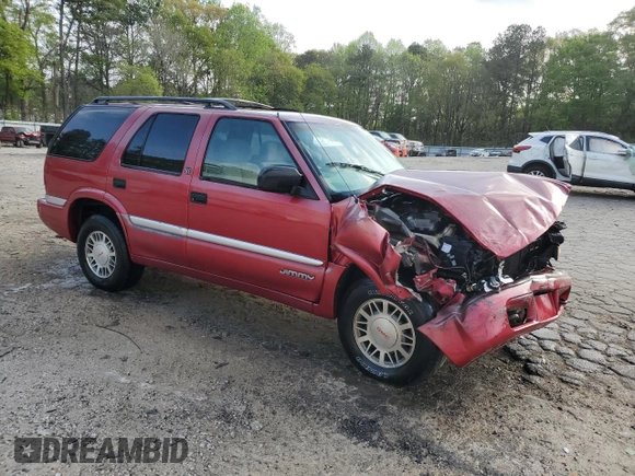 2001 GMC Jimmy SLE with VIN 1GKDT13W912214882, listed as a Copart auction lot 51258815 with 261,664 mi miles and Salvage Title. Bid and sale history available at carsss.com. Image 4.