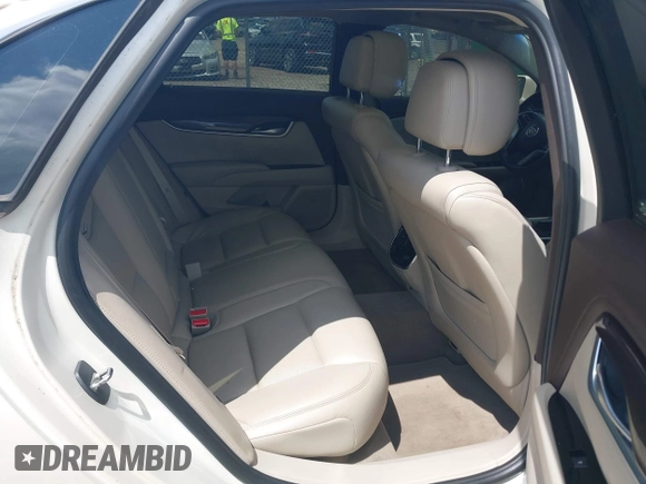 2013 Cadillac XTS Luxury with VIN 2G61P5S34D9138319, listed as a IAAI auction lot 42626756 with 88,743 mi miles and . Bid and sale history available at DreamBid. Image 8.