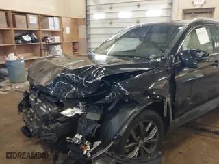 2022 Volkswagen Tiguan SE with VIN 3VV2B7AX0NM111869, listed as a IAAI auction lot 41621479 with 24,395 mi miles. Bid and sale history available at carsss.com. Image 6.